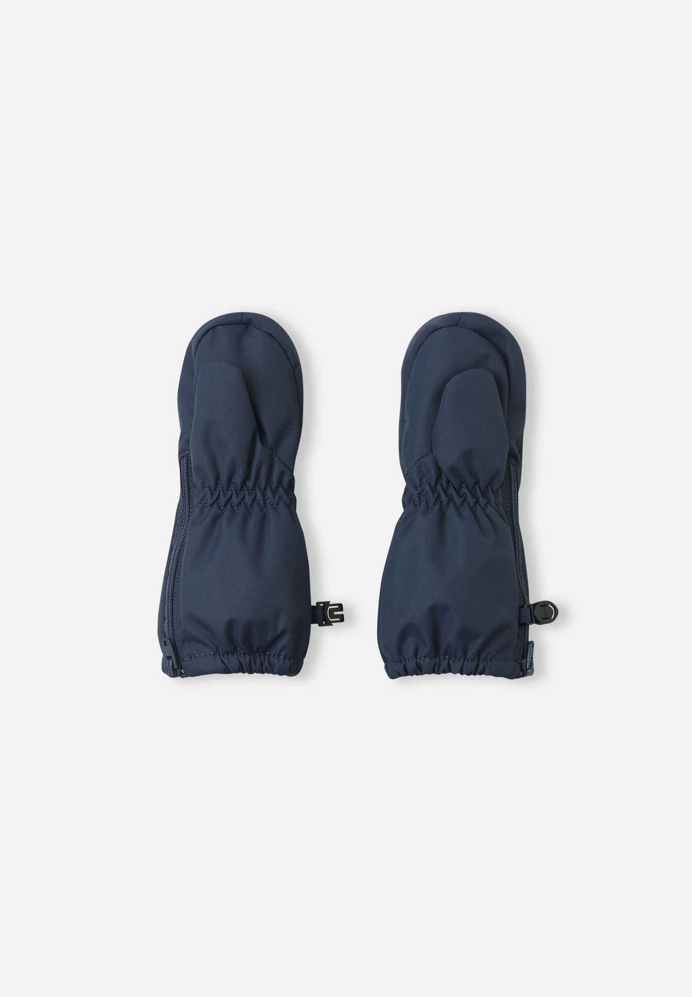 Småbarn skalvantar Poimii