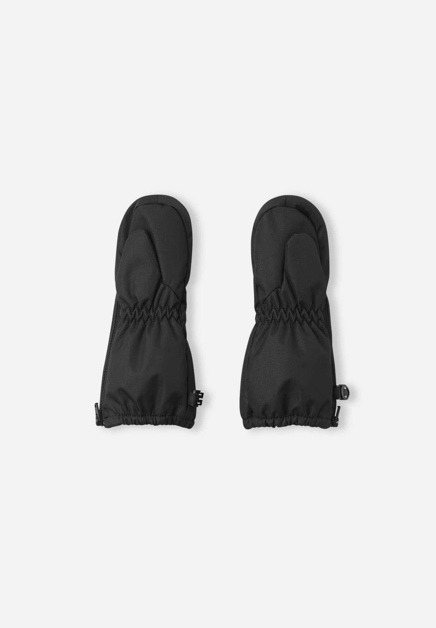 Småbarn skalvantar Poimii