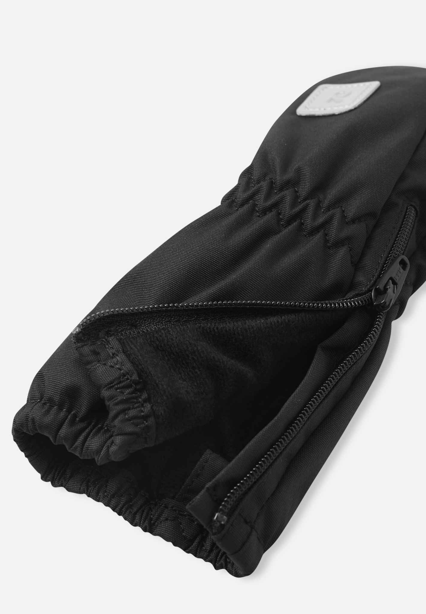 Småbarn skalvantar Poimii